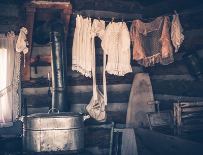 Completed domestic chores in a historical wooden cabin, Image Credit: Colourbox.