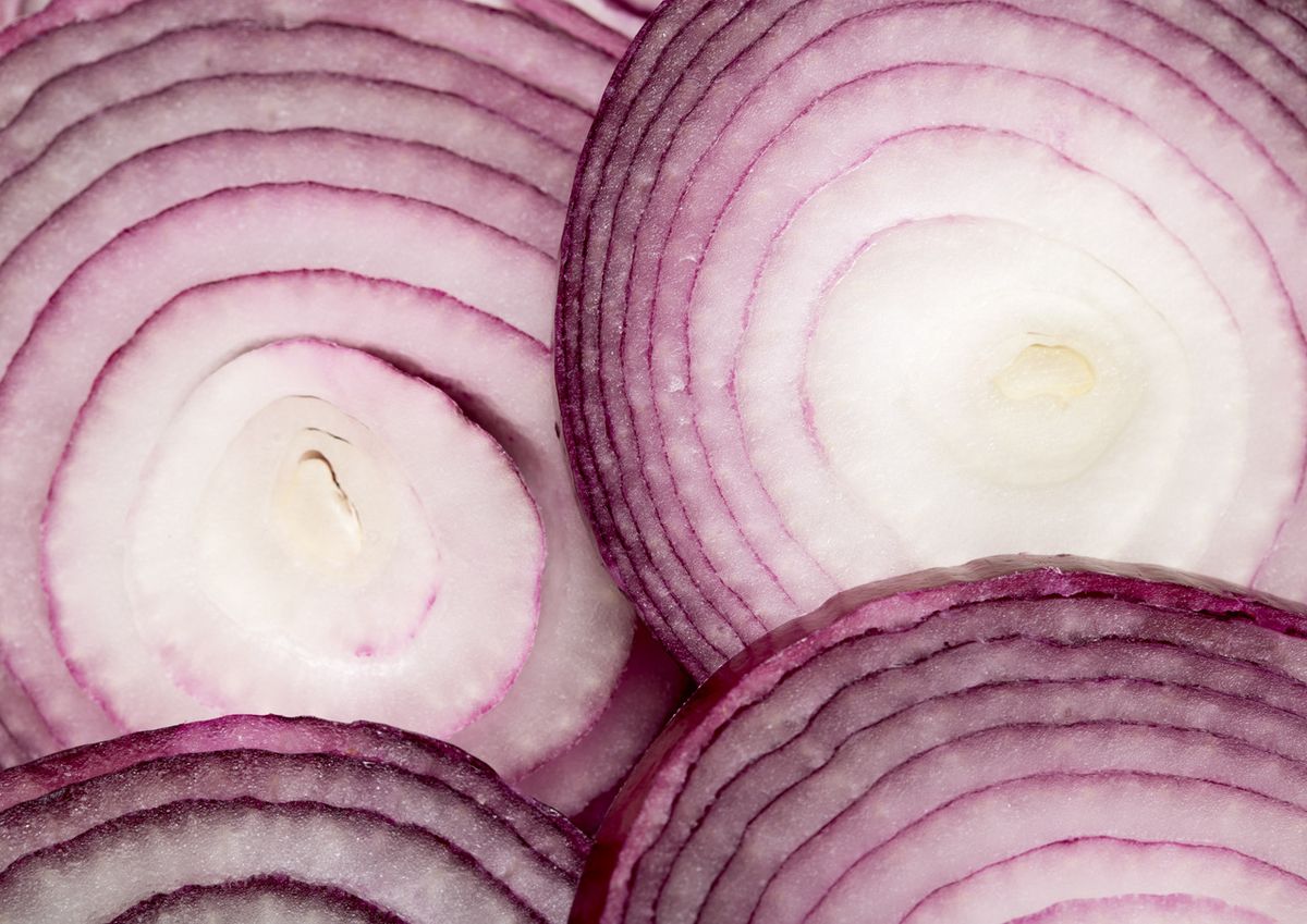 enlarge the image: Red onions cut in half